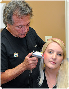 cold laser therapy for the pain of headaches, migraines and TMD